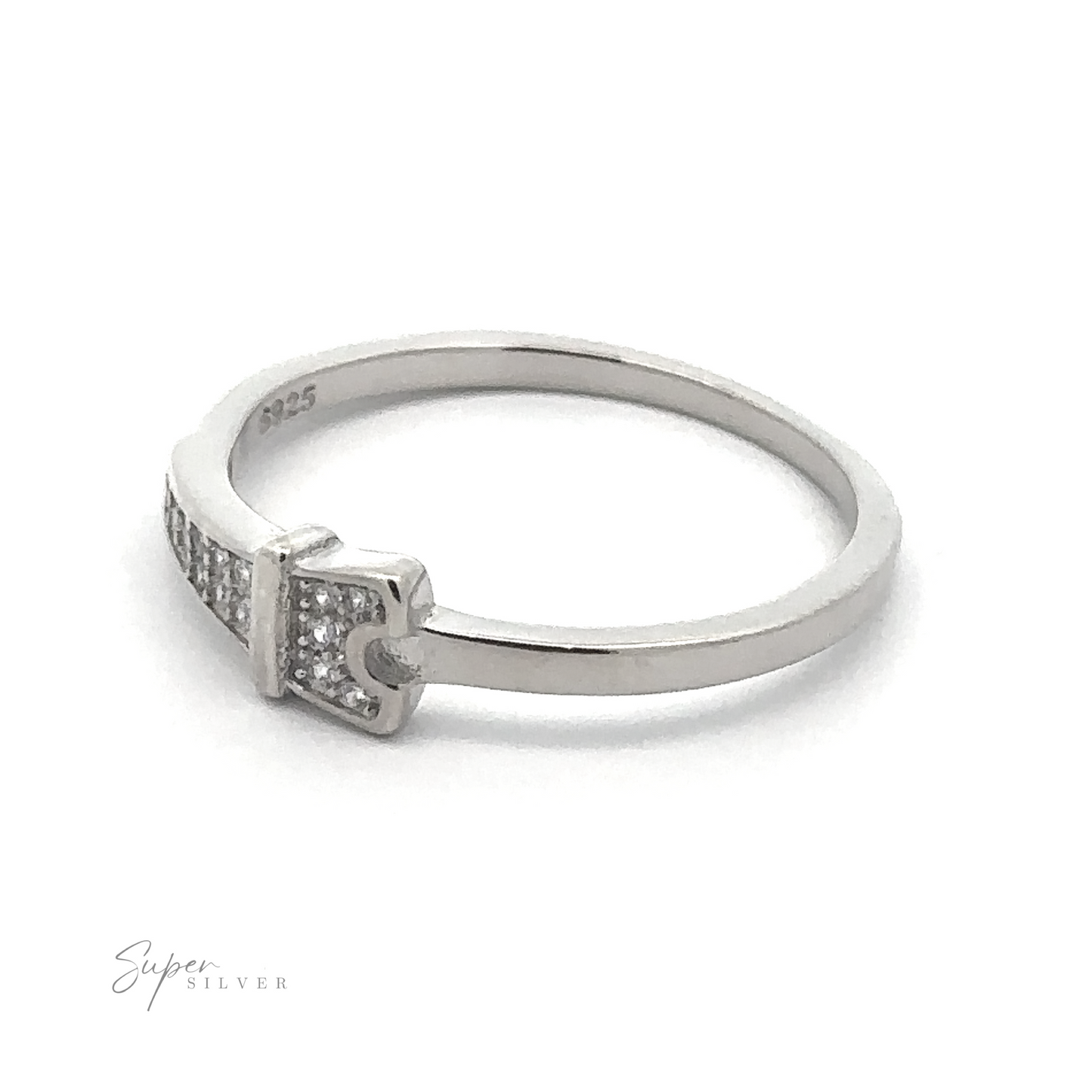 
                  
                    The Pave Cubic Zirconia Eiffel Tower Ring is a stunning silver piece with a rectangular design adorned with small, embedded stones on one side, radiating Parisian elegance. Engraved with "925" and branded "Super Silver," this ring encapsulates a timeless charm.
                  
                