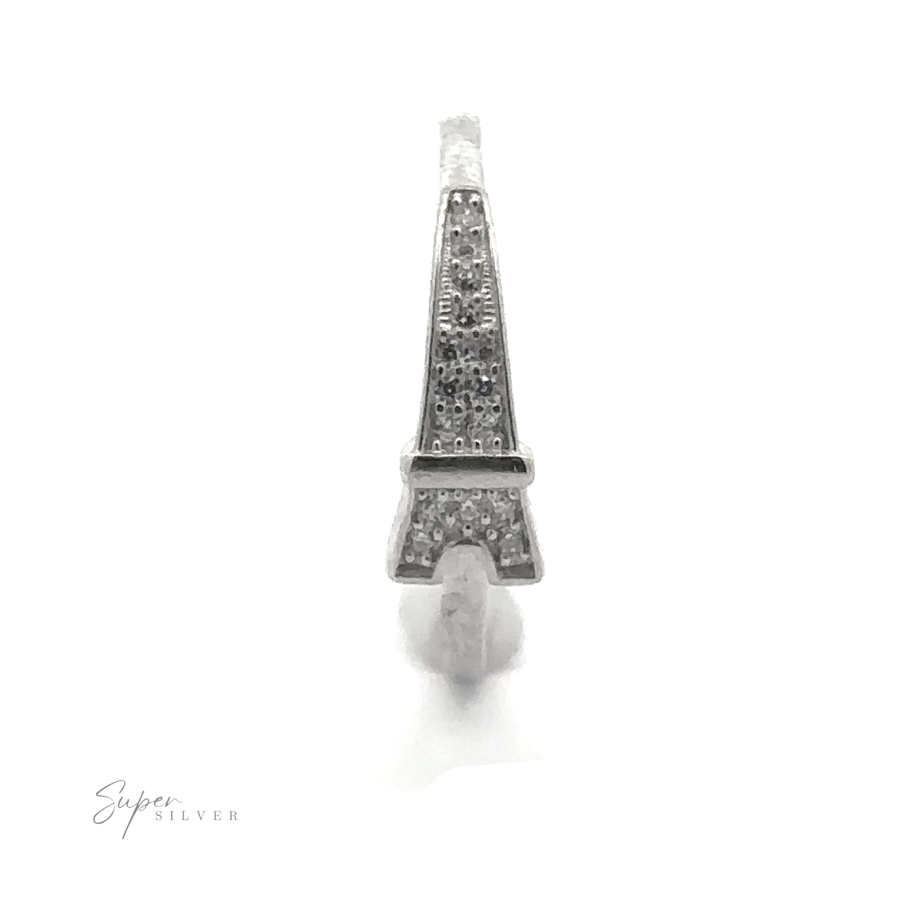 The Pave Cubic Zirconia Eiffel Tower Ring showcases the iconic shape of the Eiffel Tower with intricate textured detailing that exudes Parisian elegance on a white backdrop.