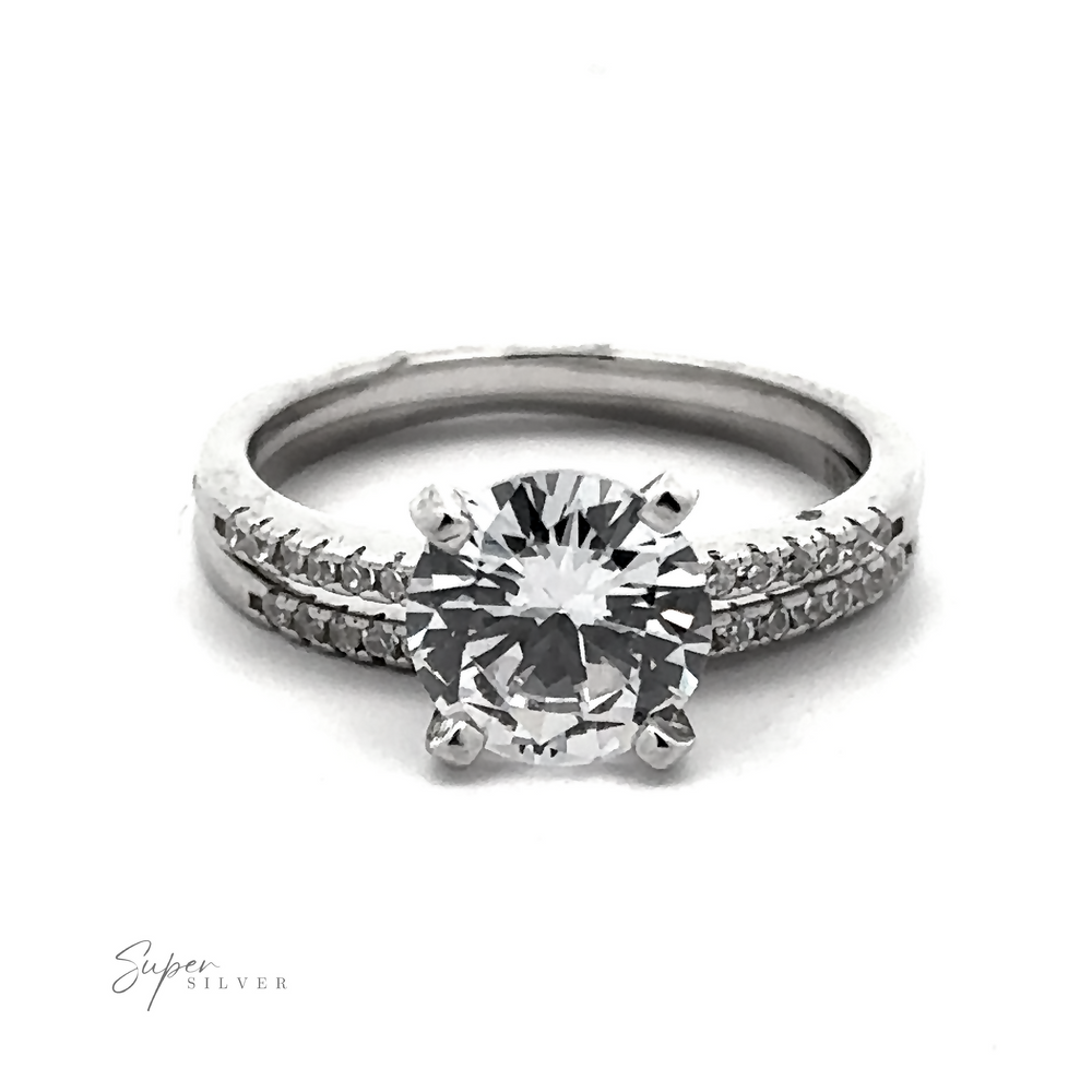 
                  
                    A Round Cubic Zirconia Wedding Set Ring with a large round solitaire diamond set in the center, flanked by rows of pave accents on the band. The text "Super Silver" appears in the bottom left corner.
                  
                