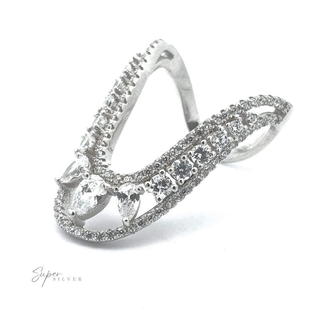 
                  
                    A unique sterling silver Long "U" CZ Ring featuring an ornate design with multiple small cubic zirconia stones and three larger pear-shaped diamonds.
                  
                