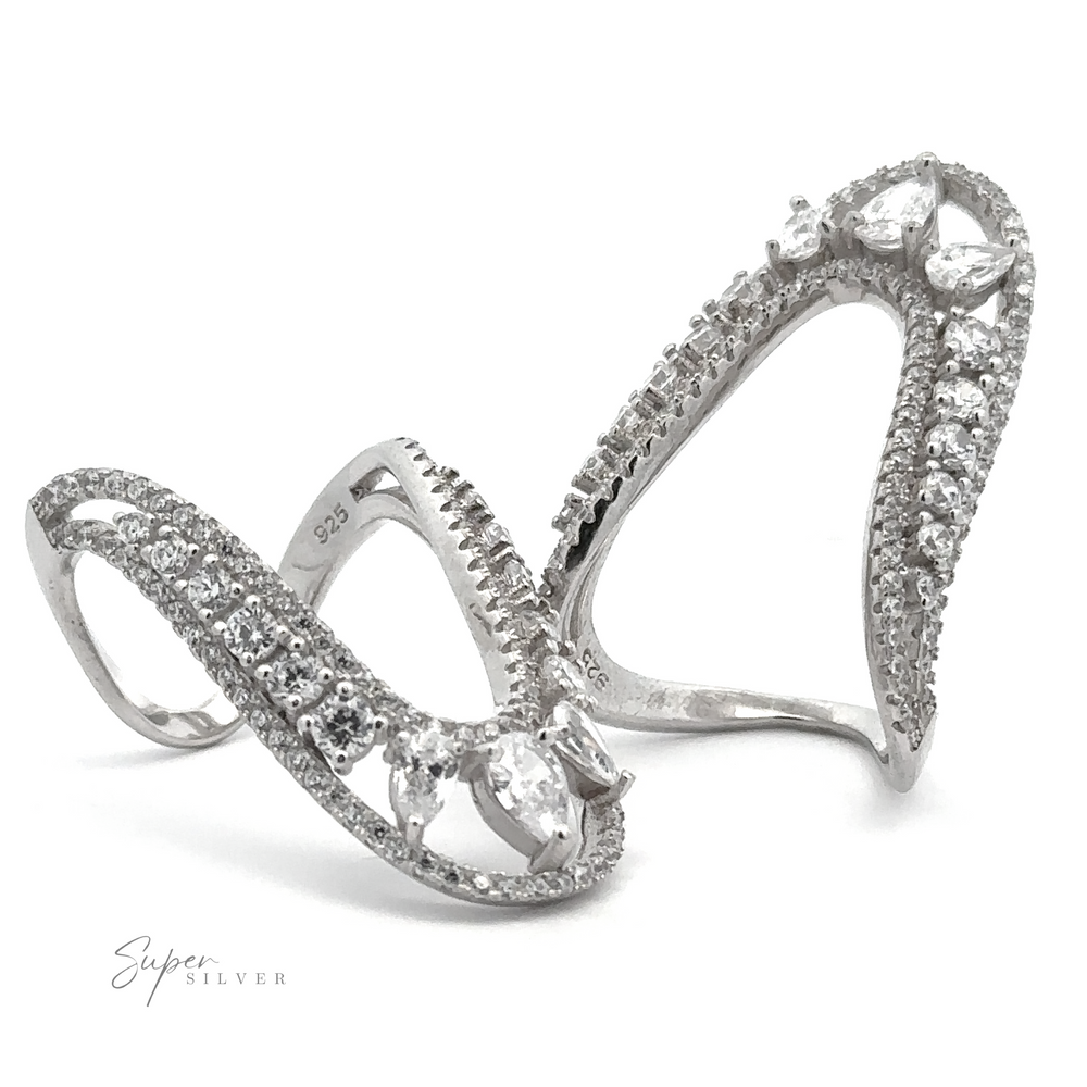 
                  
                    Two silver, diamond-encrusted Long "U" CZ Rings with intricate designs, displayed beside each other on a white background. Crafted from sterling silver, these unique rings sparkle brilliantly. The text "Super Silver" is visible in the bottom left corner.
                  
                