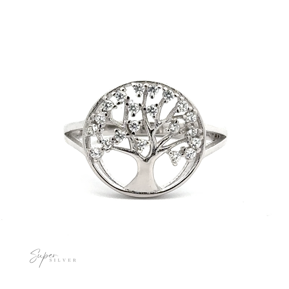 
                  
                    A Tree Of Life Ring Cubic Zirconia Stones featuring a tree of life design with small embedded cubic zirconia stones. The ring has a simple band and a round face structure, with the "Super Silver" logo visible in the bottom left corner.
                  
                