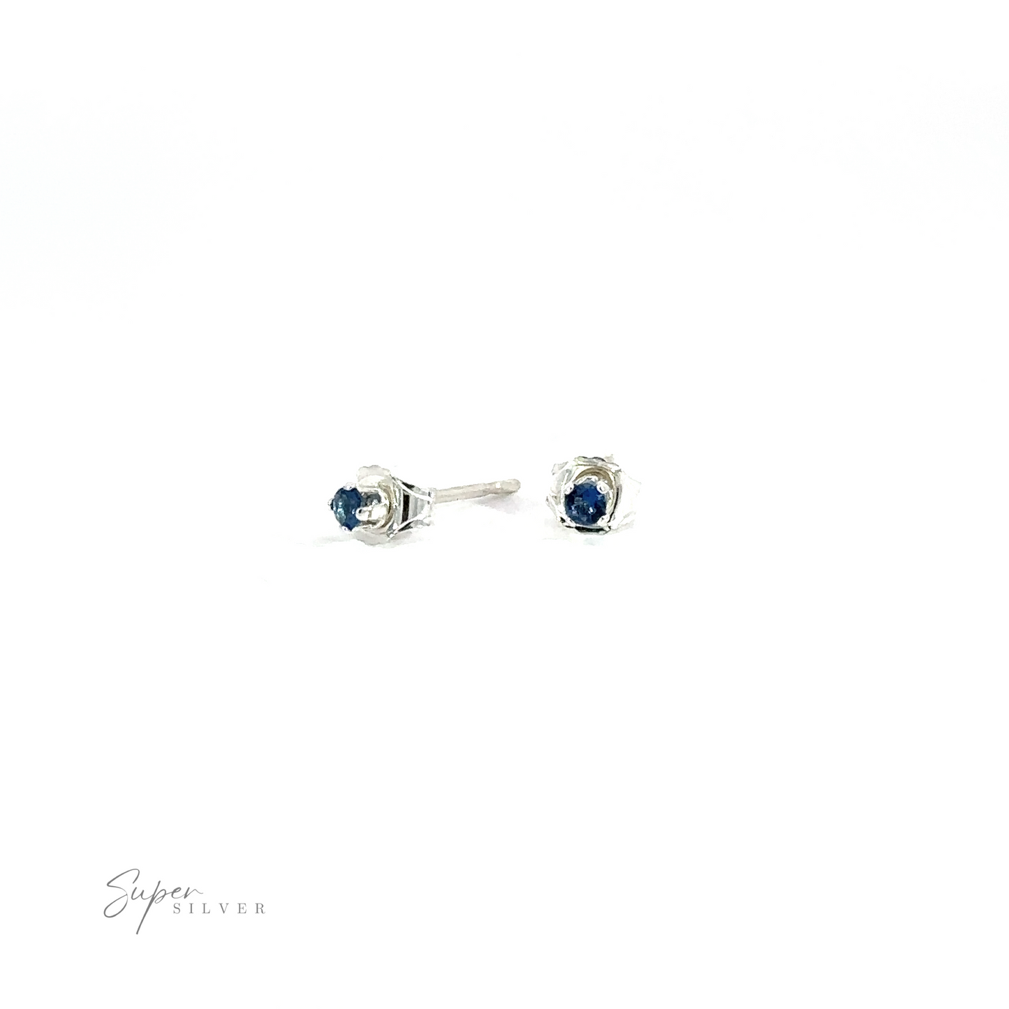 
                  
                    A pair of Round CZ Stud earrings with blue cubic zirconia gemstones against a white background.
                  
                