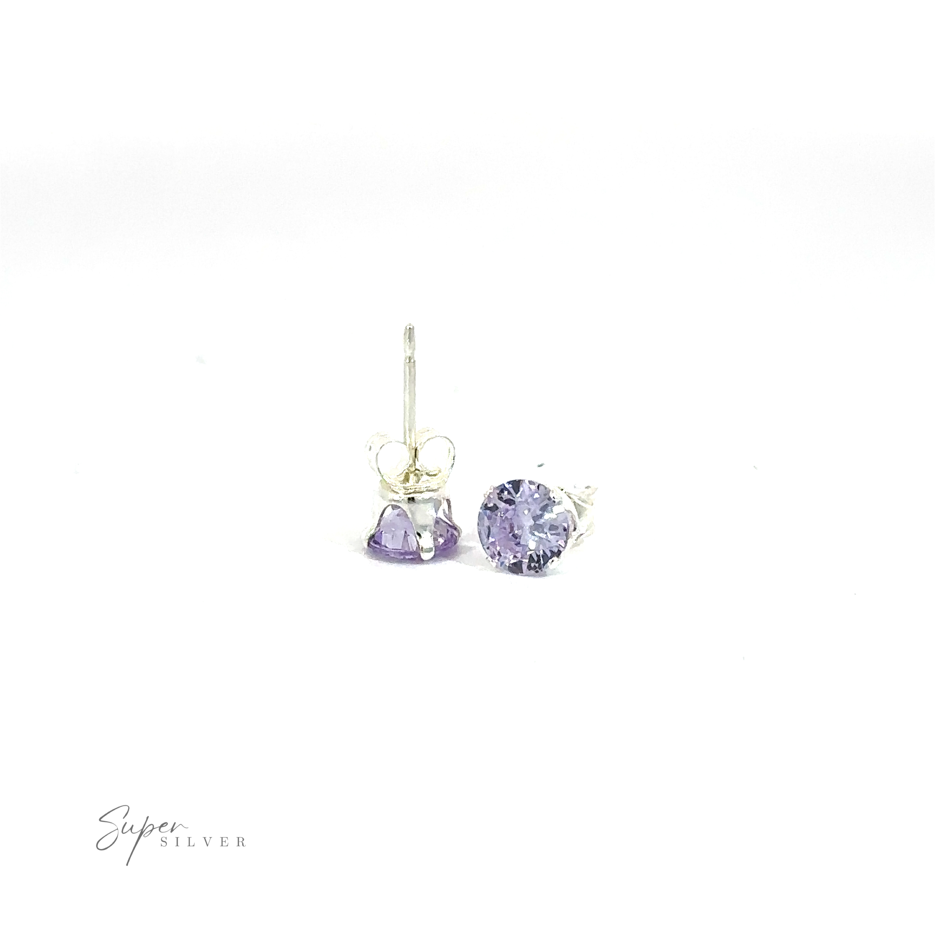 Pair of silver Round CZ Studs with purple cubic zirconia on a white background.