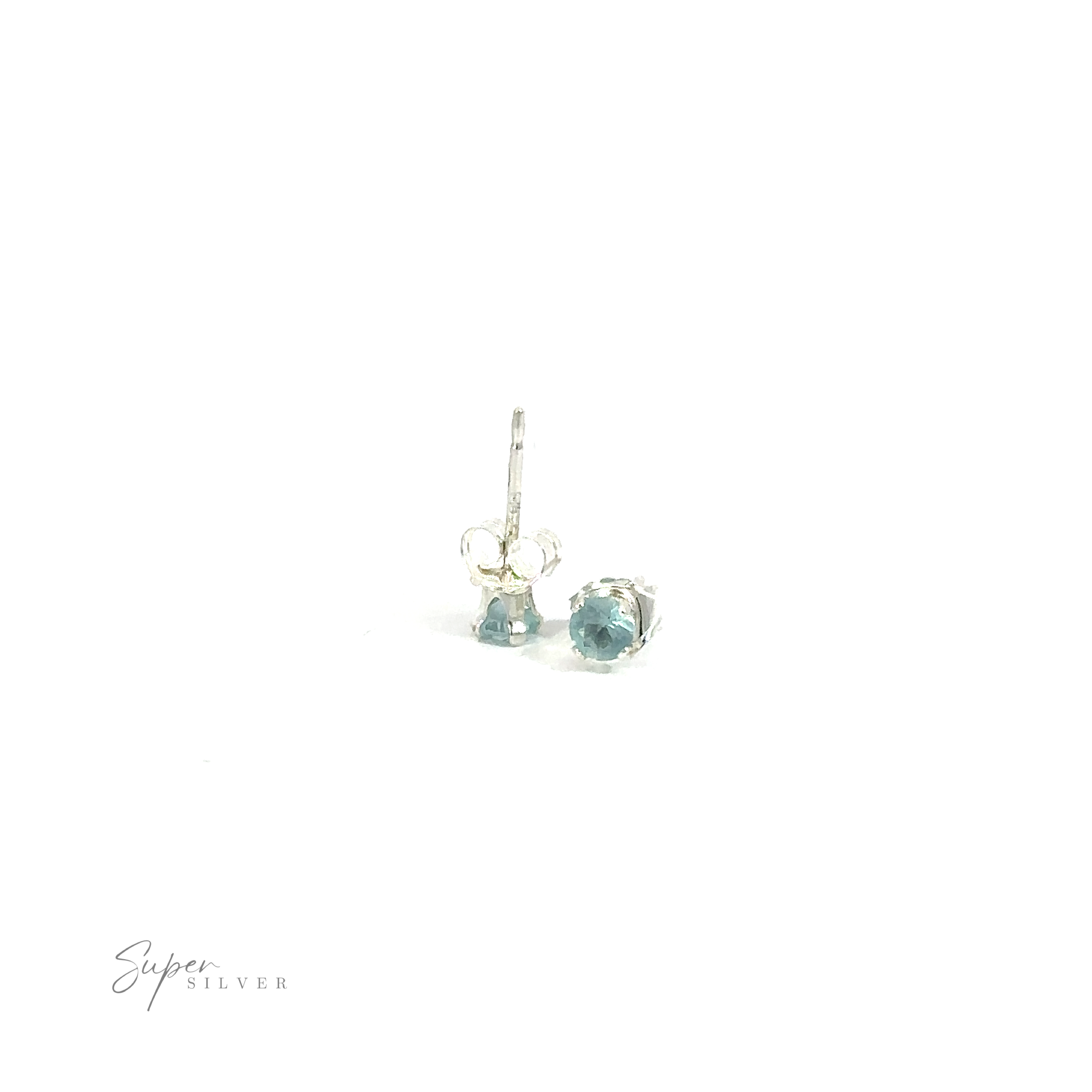 A pair of Round CZ Stud earrings on a white background.