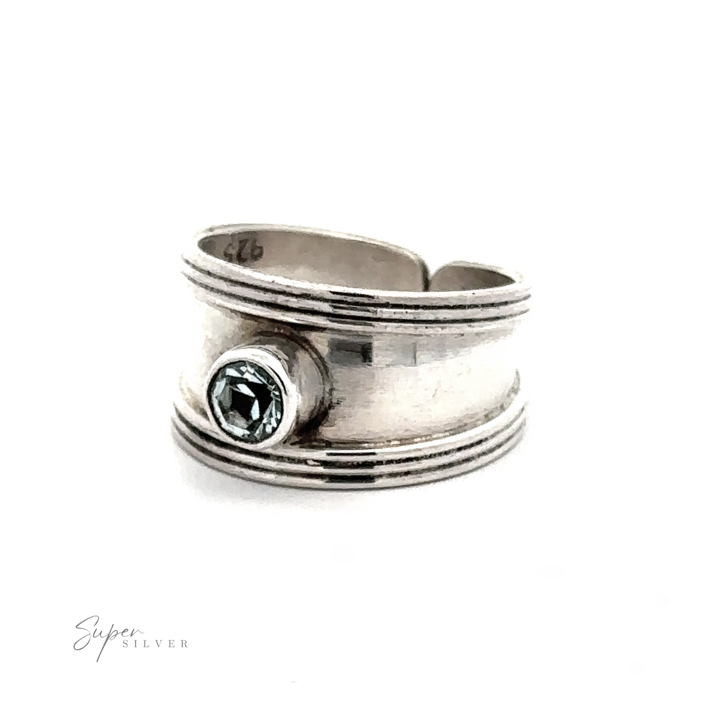 
                  
                    Adjustable Wide Cigar Band Toe Ring with Gemstone toe ring featuring a wraparound design with a single green gemstone, displayed against a white background.
                  
                