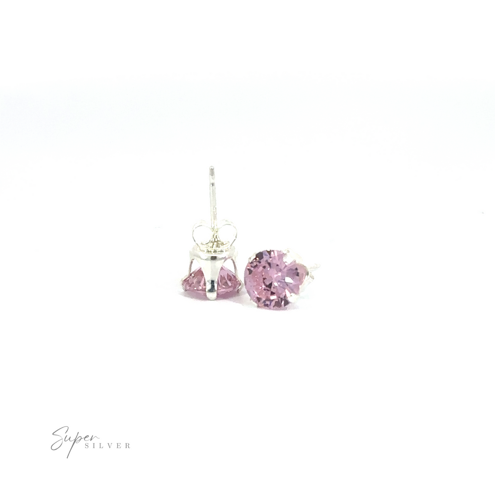 
                  
                    A pair of silver Round CZ Studs on a white background.
                  
                