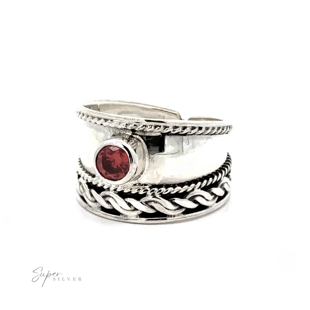 
                  
                    Adjustable Wide Cigar Band Toe Ring with Gemstone toe ring with a red gemstone, featuring braided and textured band designs, displayed against a white background.
                  
                
