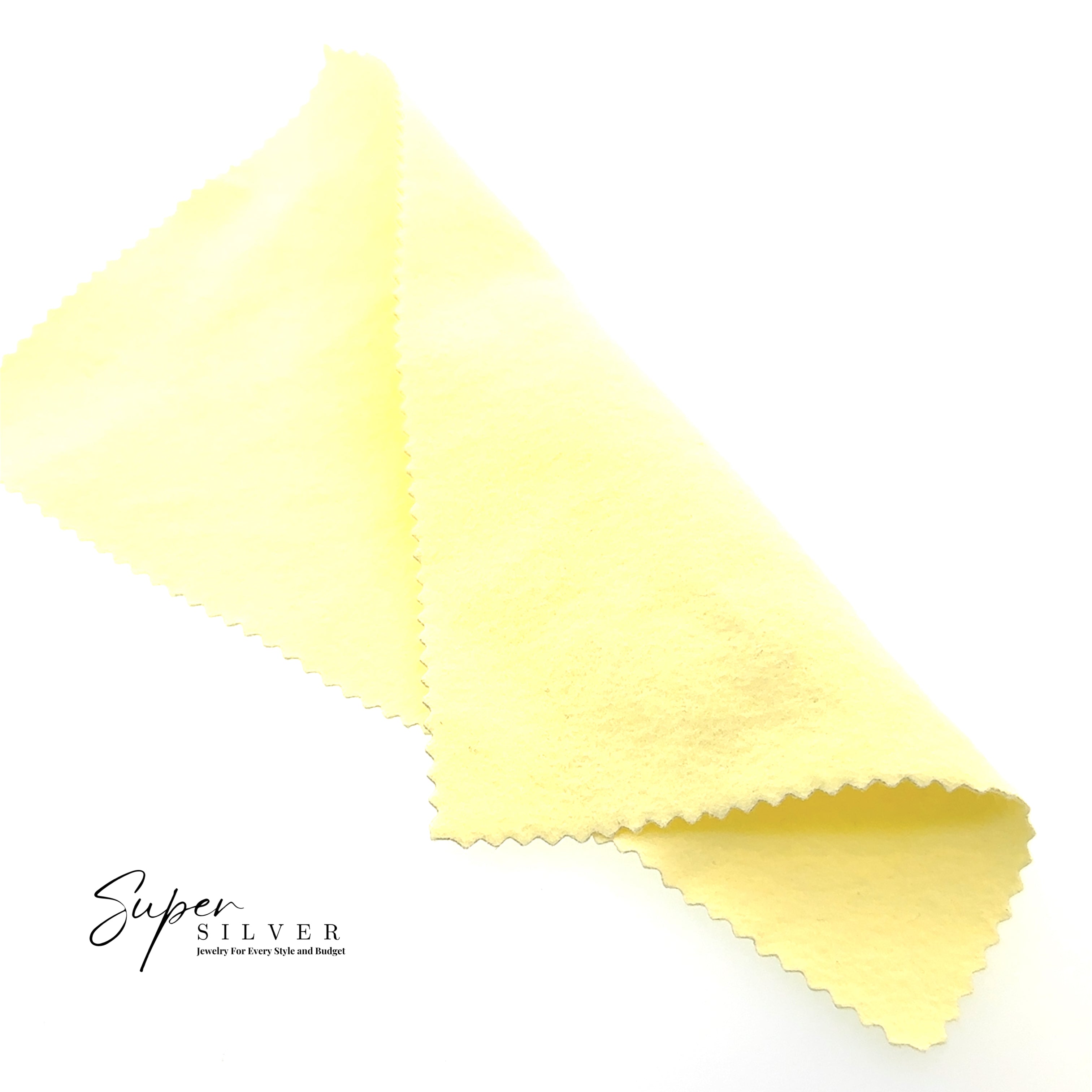 A yellow Polishing Cloth with zigzag edges is displayed on a white background. The text "Super Silver Jewelry Care" and "CHANGES" appears in the lower left corner.