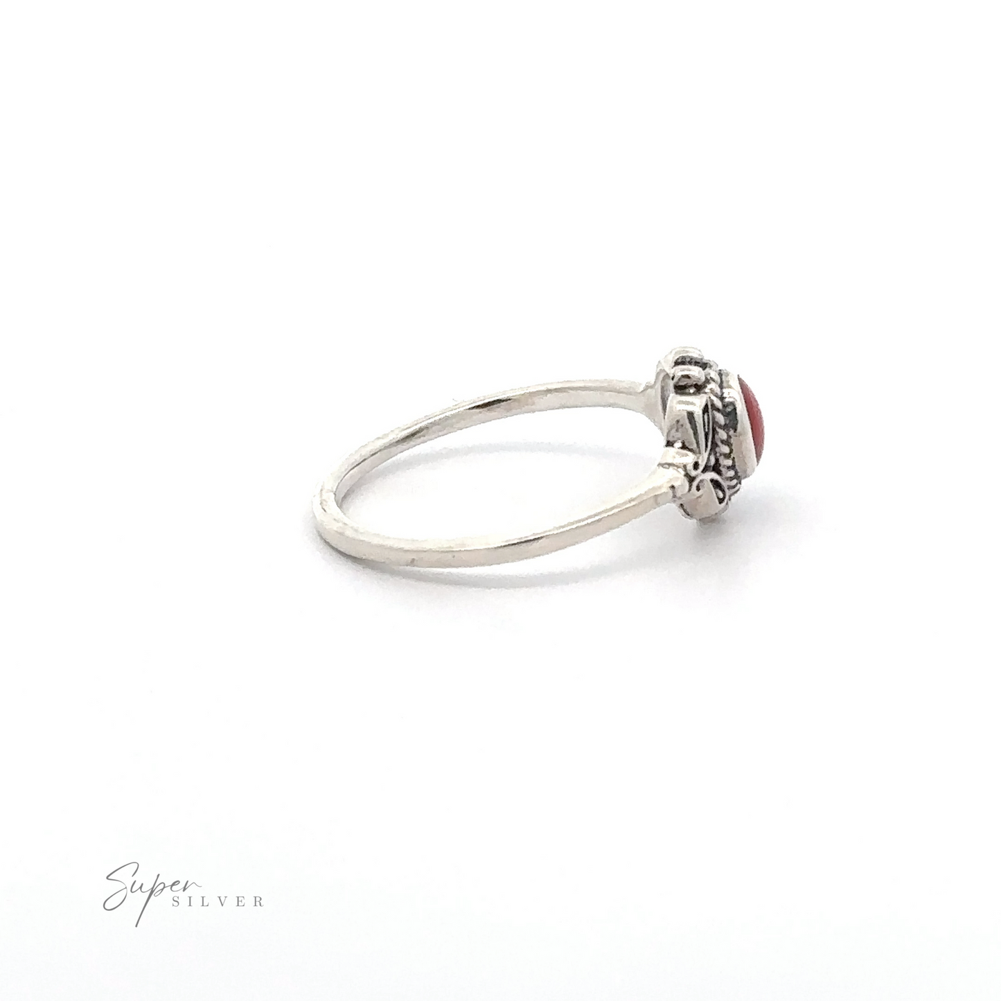 
                  
                    A Dainty Inlaid Stone Ring with Filigree featuring a red coral stone.
                  
                