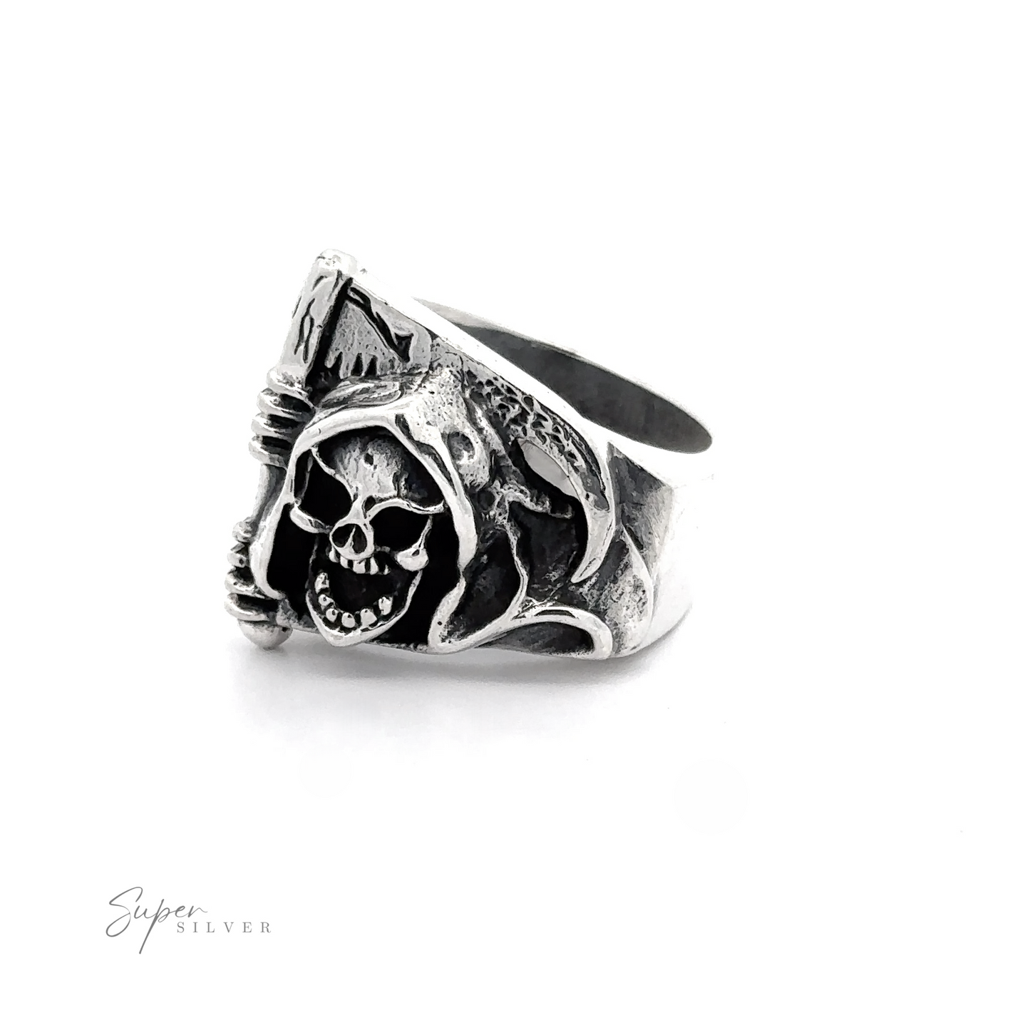 A sterling silver ring featuring a detailed skull with a hood and scythe design, set against a white background, this Grim Reaper With Scythe Ring makes for an unmistakable statement piece.