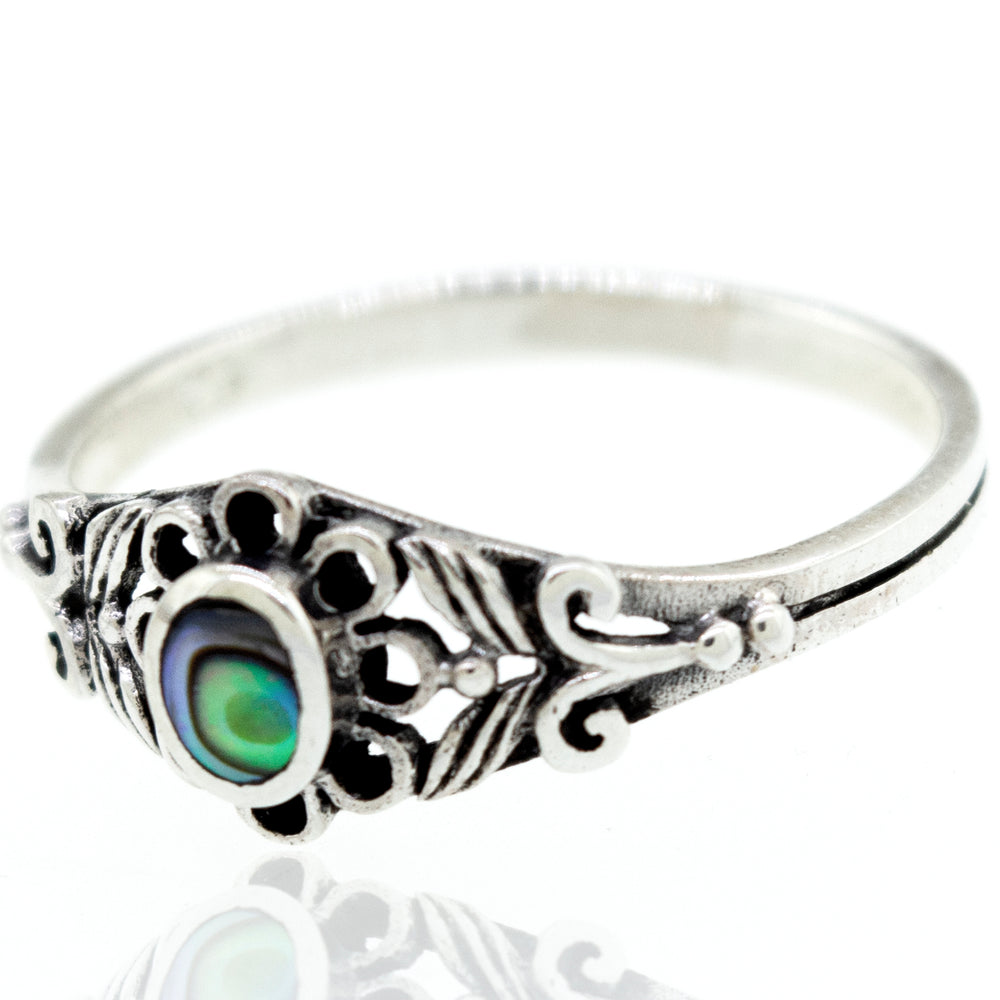 
                  
                    A Super Silver oval flower ring with inlay stones, featuring a green and black stone resembling a flower.
                  
                