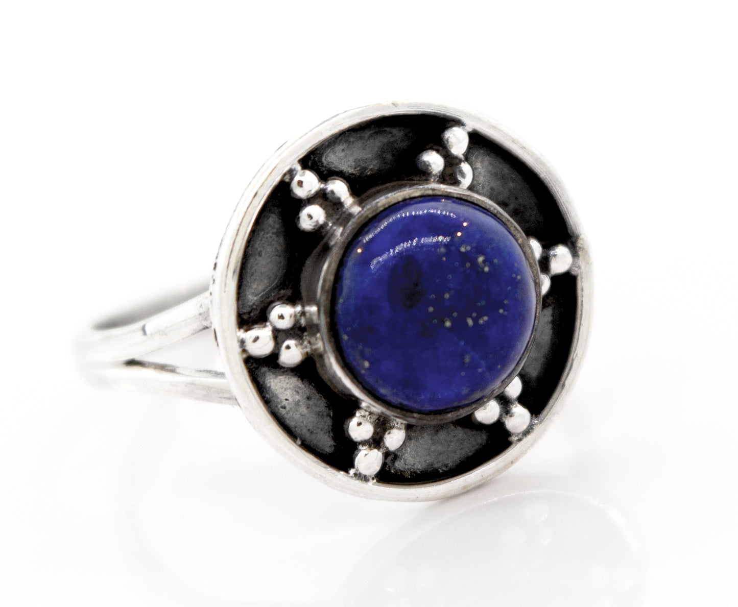 
                  
                    Gemstone Ring With Unique Oxidized Design, featuring a circular blue lapis lazuli centerpiece and oxidized silver bead accents around the stone.
                  
                