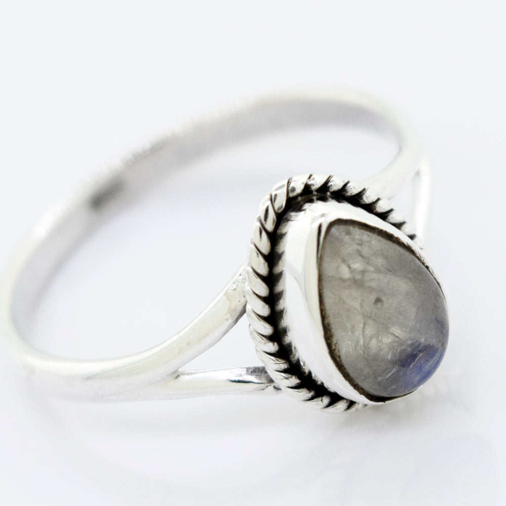 
                  
                    Vibrant Teardrop Shape Stone Ring with a teardrop-shaped moonstone set in a detailed bezel, displayed against a white background.
                  
                