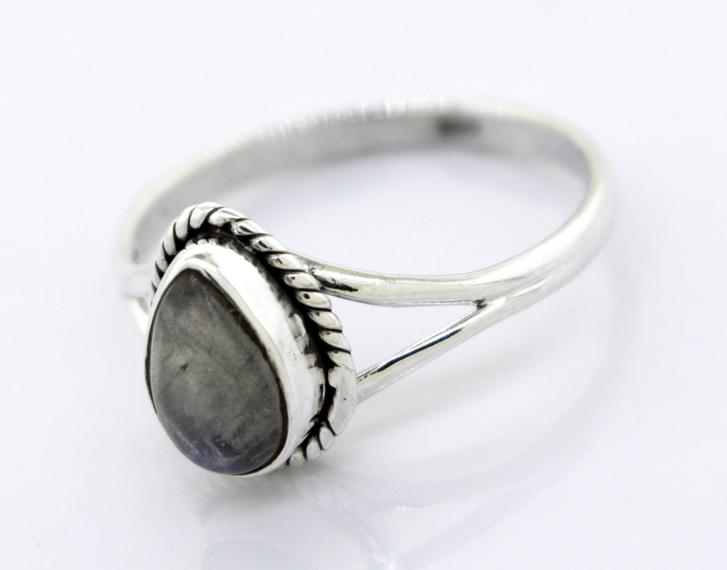 
                  
                    Vibrant Teardrop Shape Stone Ring with a teardrop-shaped grey stone set in a detailed bezel, against a white background.
                  
                