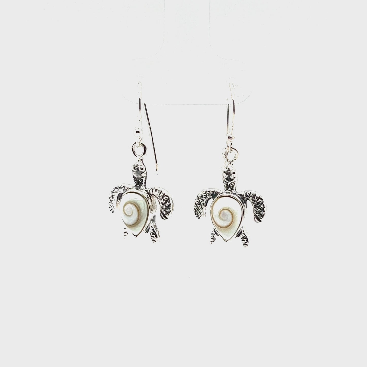 
                  
                    Load and play video in Gallery viewer, Sea Turtle Earrings with Shiva Shell
                  
                