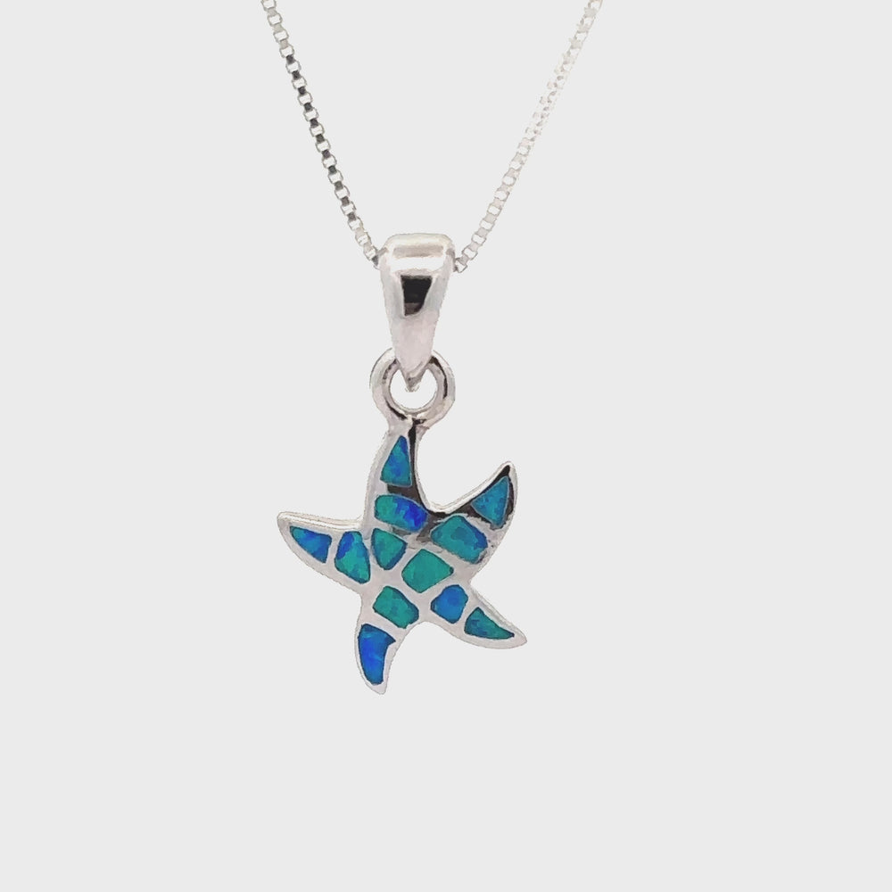 
                  
                    Load and play video in Gallery viewer, Small Lab-Created Opal Sea Star Pendant
                  
                