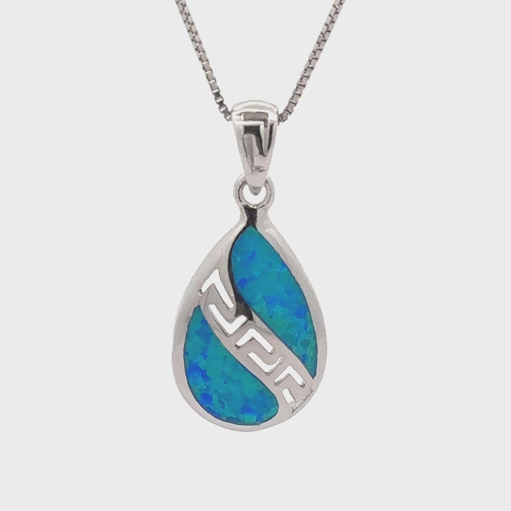 
                  
                    Load and play video in Gallery viewer, Teardrop Lab-Created Opal Pendant
                  
                