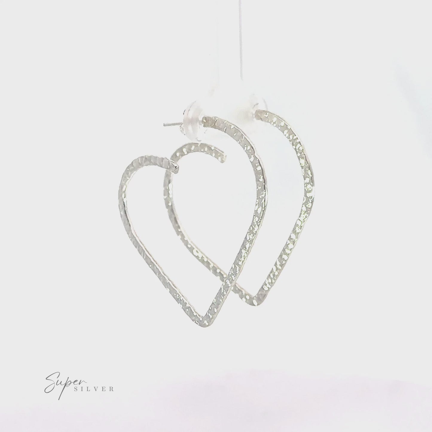 
                  
                    Load and play video in Gallery viewer, Textured Heart Hoop Earring
                  
                