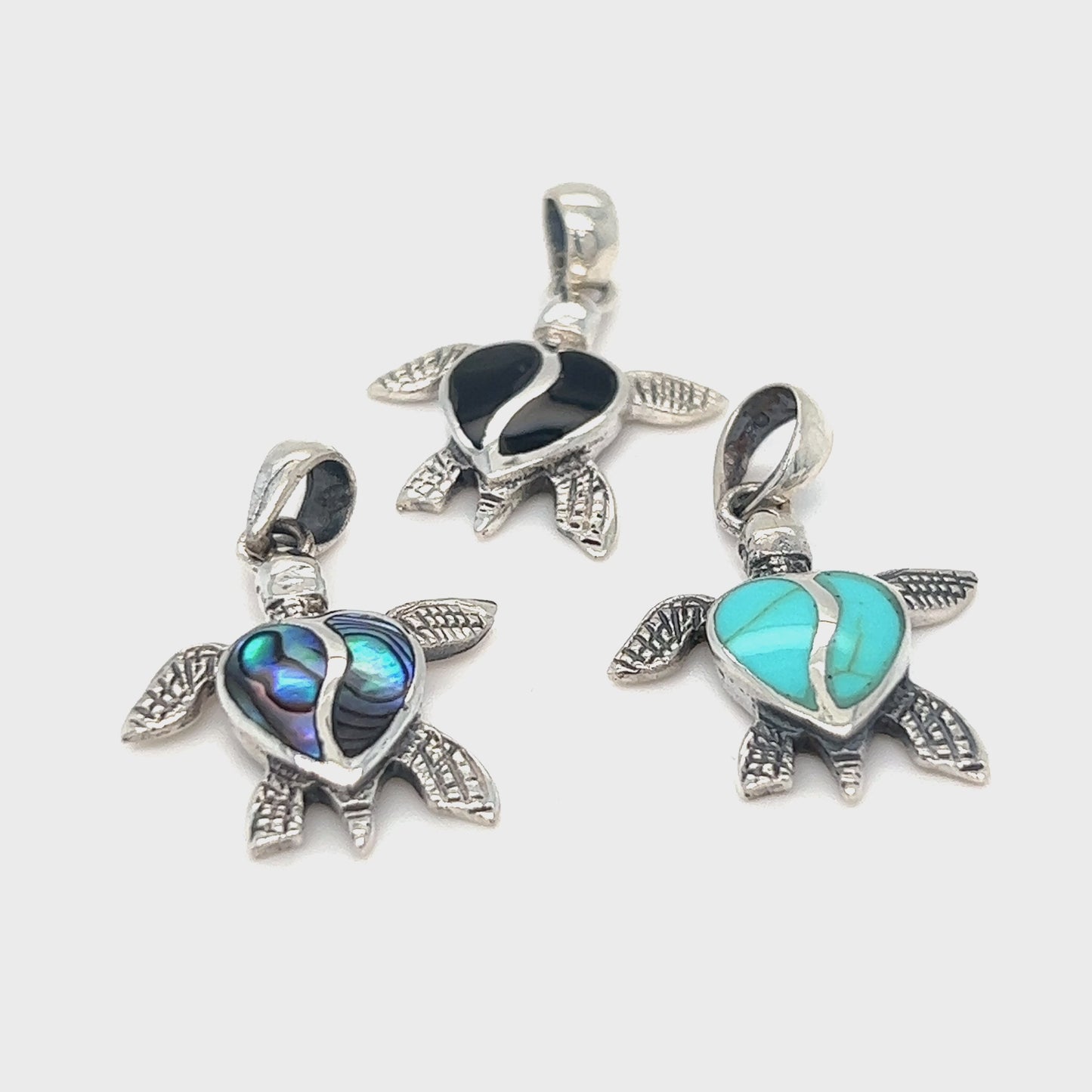 
                  
                    Load and play video in Gallery viewer, Stone Inlay Turtle Pendant
                  
                