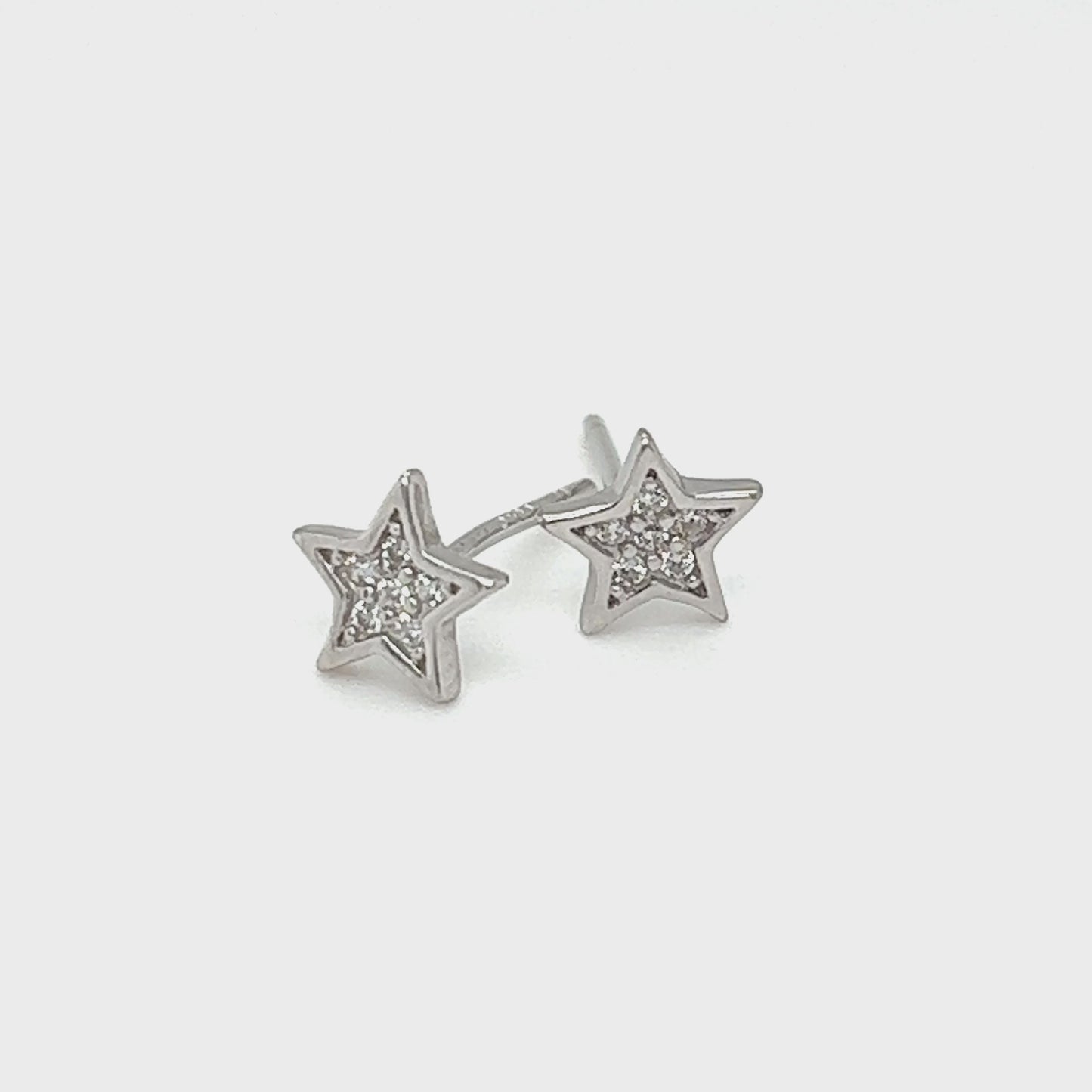 
                  
                    Load and play video in Gallery viewer, Cubic Zirconia Star Stud Earrings
                  
                