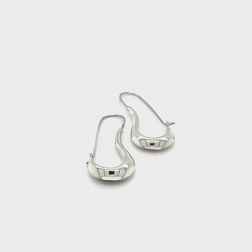 
                  
                    Load and play video in Gallery viewer, Curved Hoop Earring
                  
                