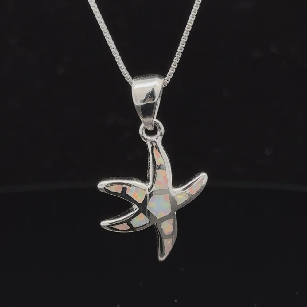 
                  
                    Load and play video in Gallery viewer, Lab-Created Opal Sea Star Pendant
                  
                