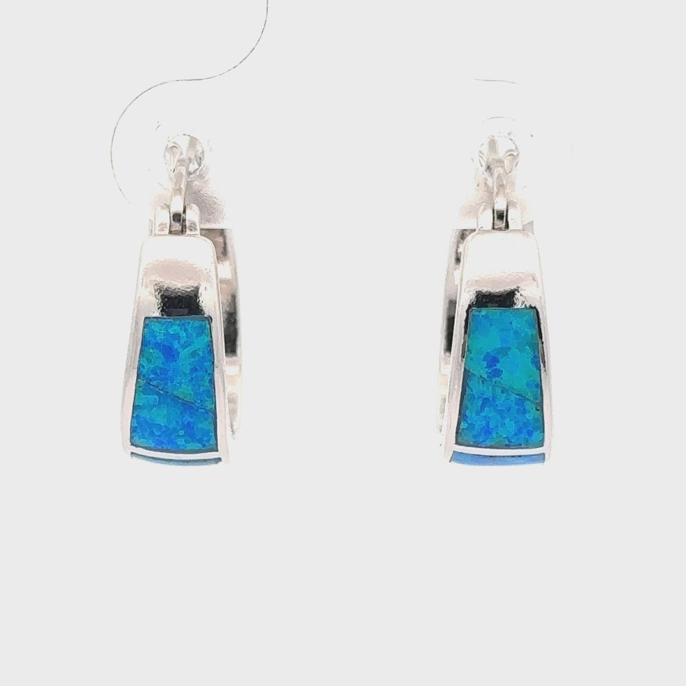 
                  
                    Load and play video in Gallery viewer, Blue Lab-Created Opal Huggie Hoop Earrings
                  
                