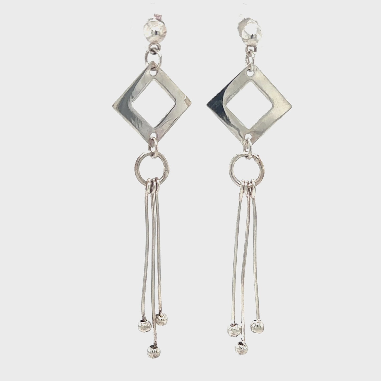 
                  
                    Load and play video in Gallery viewer, Diamond Shaped Post Earrings with Tassel
                  
                