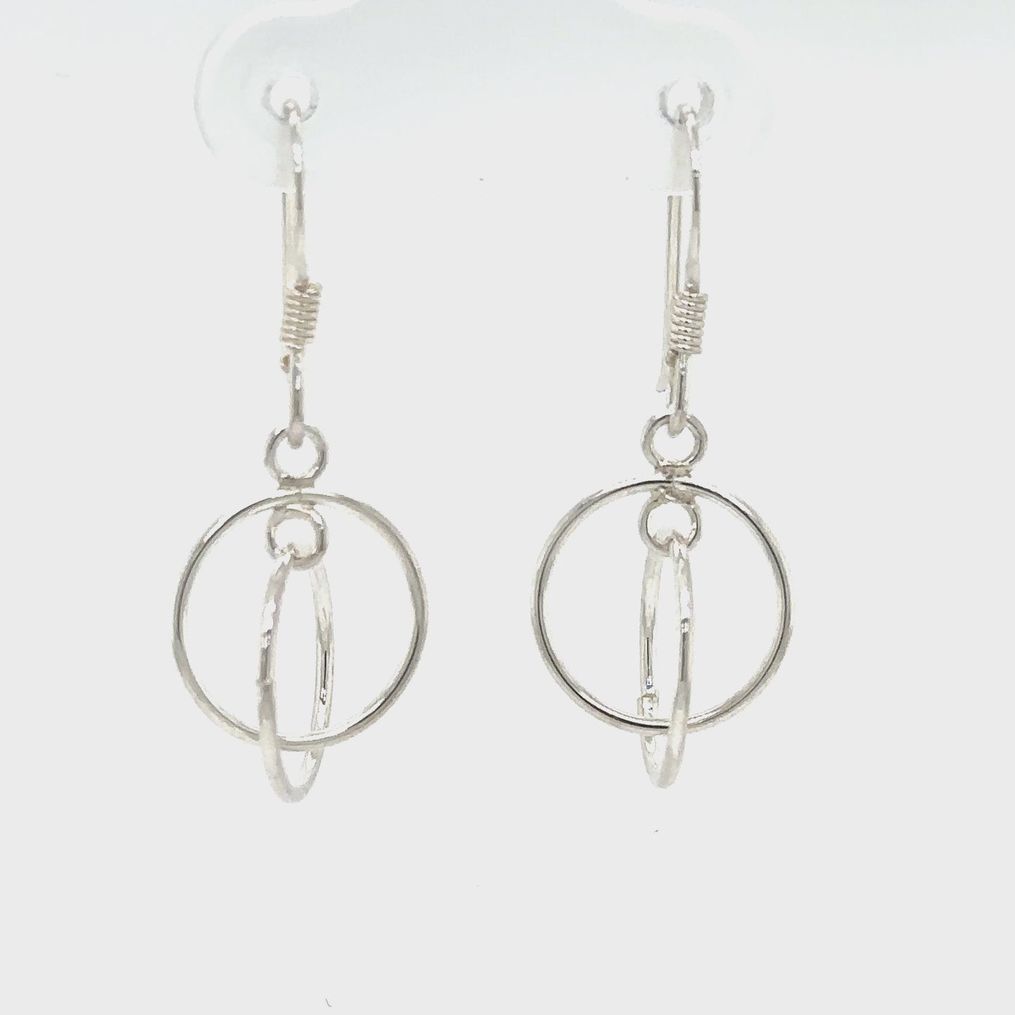 
                  
                    Load and play video in Gallery viewer, Interlinked Circle Earrings
                  
                