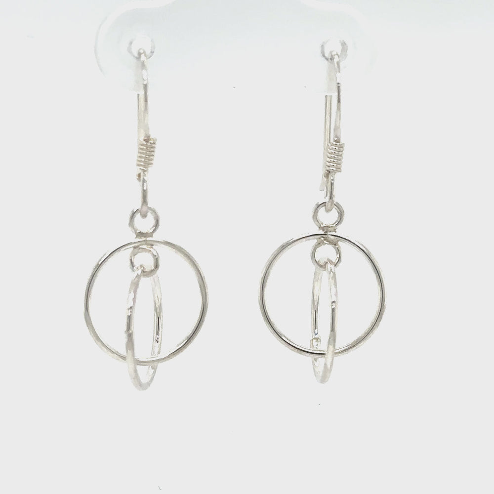 
                  
                    Load and play video in Gallery viewer, Interlinked Circle Earrings
                  
                