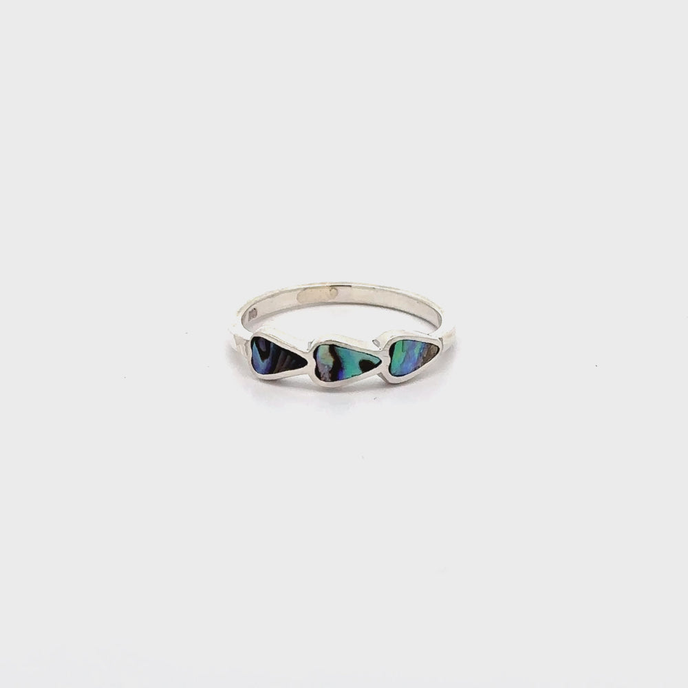 
                  
                    Load and play video in Gallery viewer, Triple Heart Ring with Inlaid Stones
                  
                