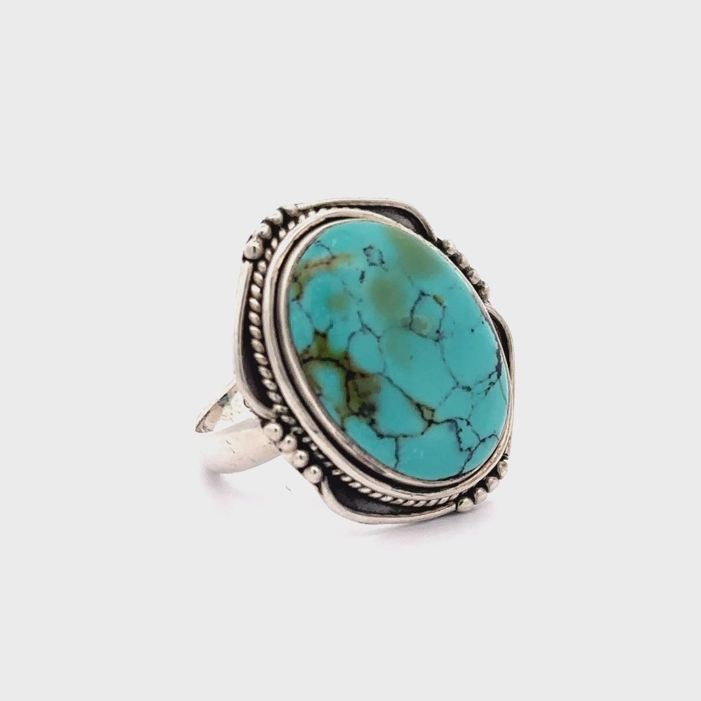 
                  
                    Load and play video in Gallery viewer, Natural Turquoise Ring With Rope Design
                  
                
