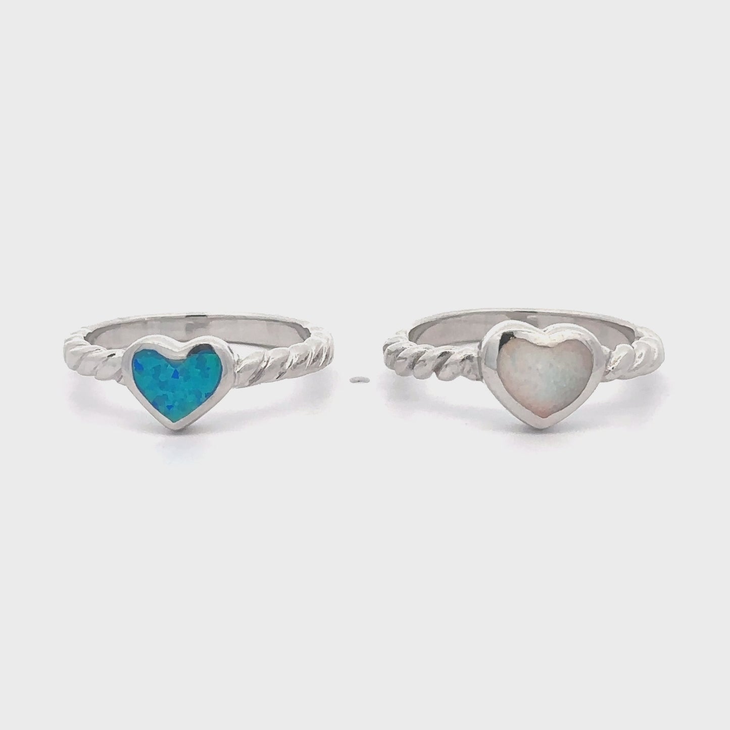 
                  
                    Load and play video in Gallery viewer, Lab Opal Heart Ring with Twisted Band
                  
                
