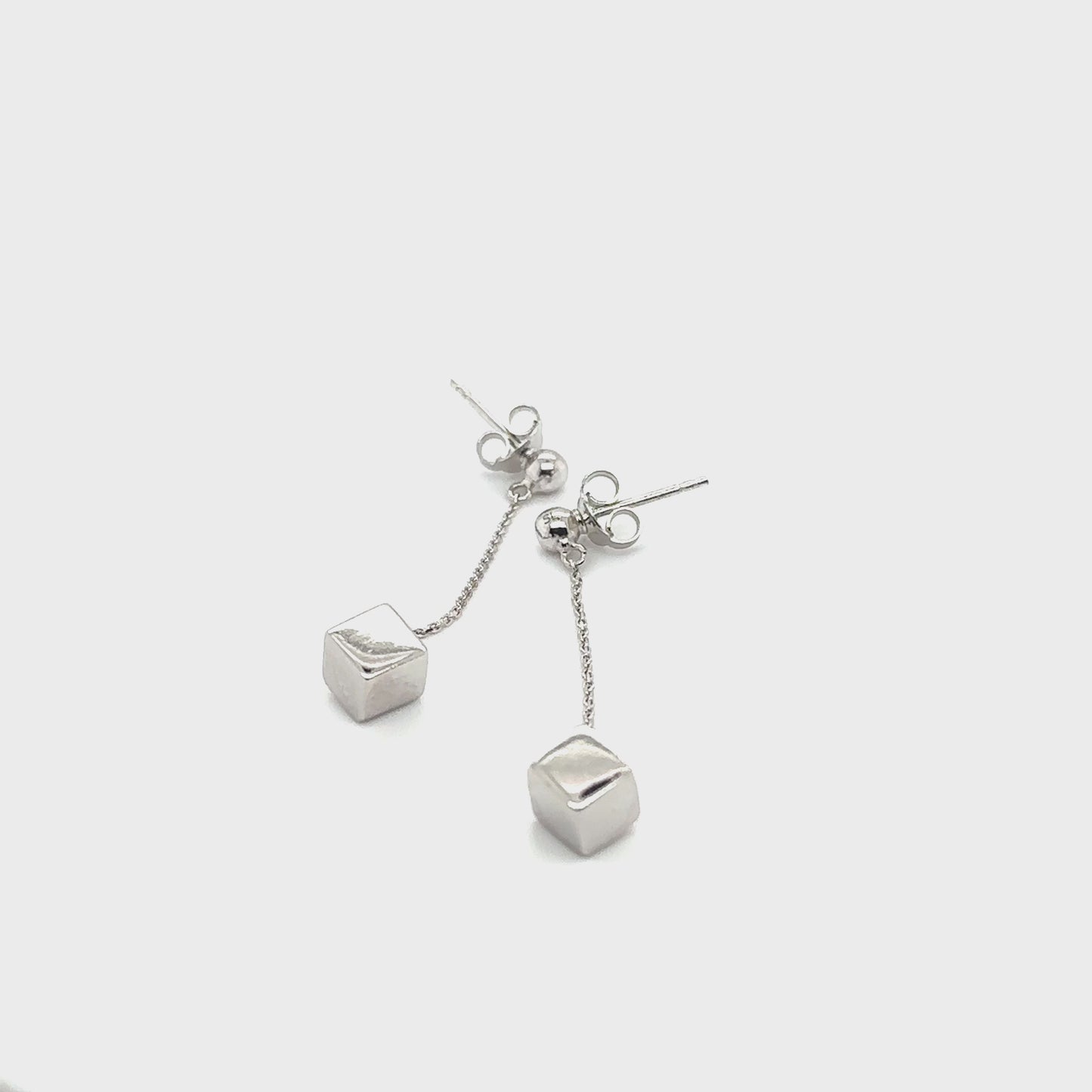 
                  
                    Load and play video in Gallery viewer, Silver Drop Earrings with a Solid Cube
                  
                