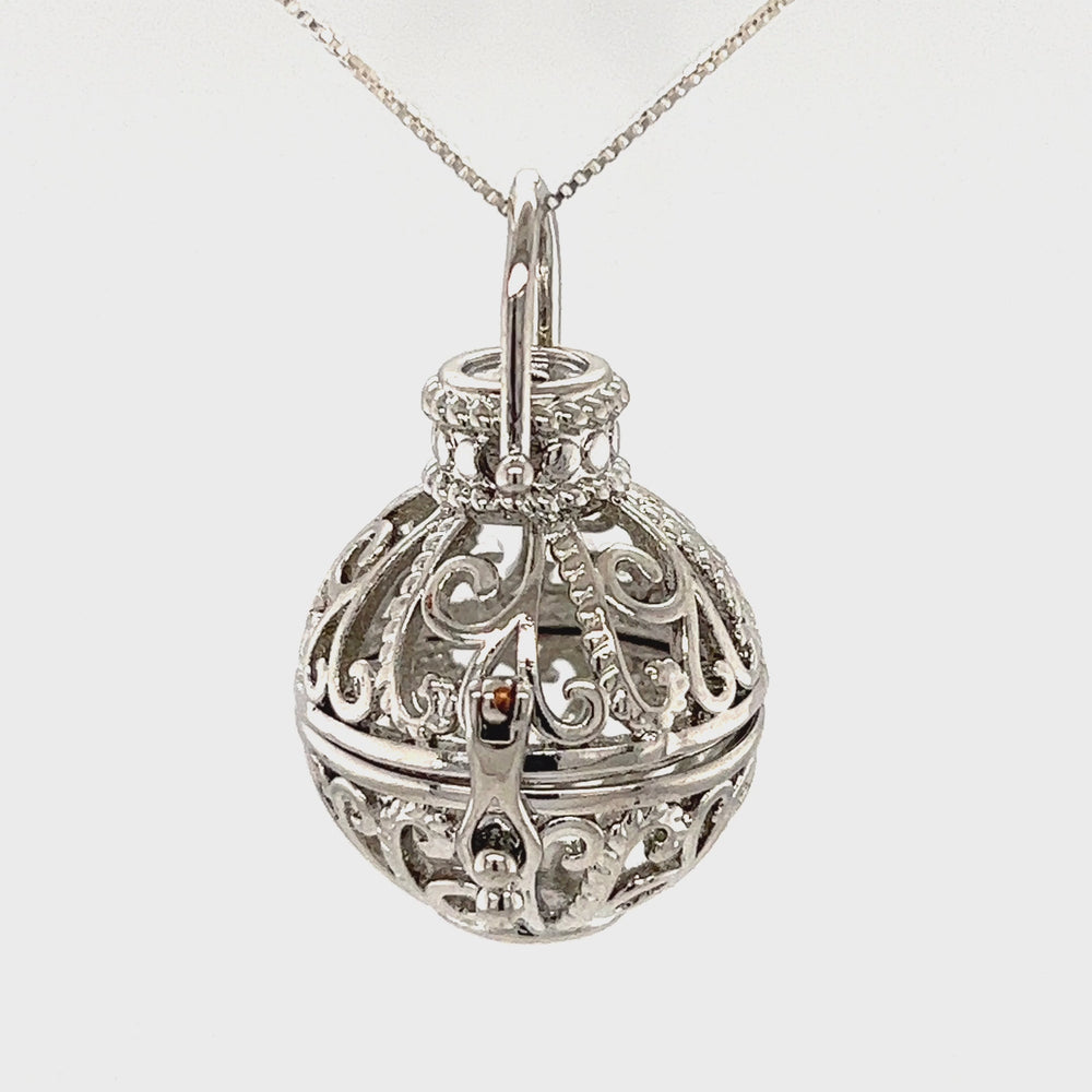 
                  
                    Load and play video in Gallery viewer, Filigree Cage Pendant
                  
                