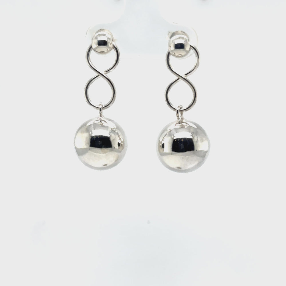 
                  
                    Load and play video in Gallery viewer, Dangly Silver Ball Earring
                  
                