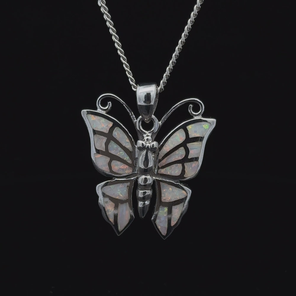 
                  
                    Load and play video in Gallery viewer, Lab-Created Opal Butterfly Pendant
                  
                