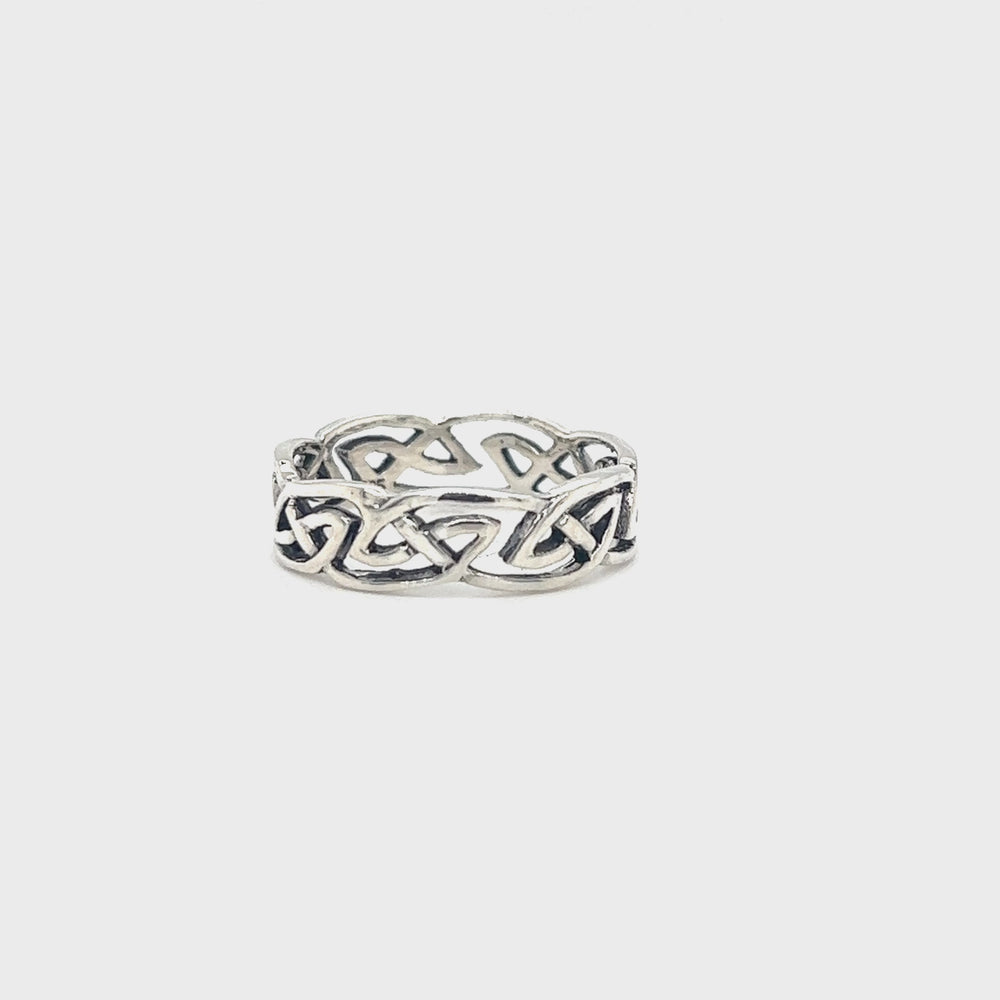 
                  
                    Load and play video in Gallery viewer, Wavy Celtic Band Ring
                  
                