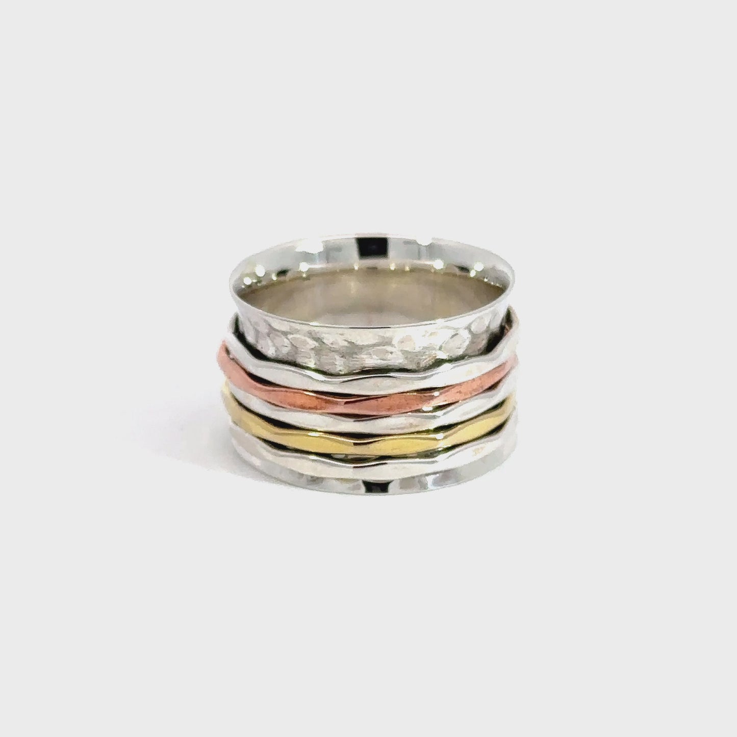 
                  
                    Load and play video in Gallery viewer, Handmade Hammered Tricolor Spinner Ring
                  
                