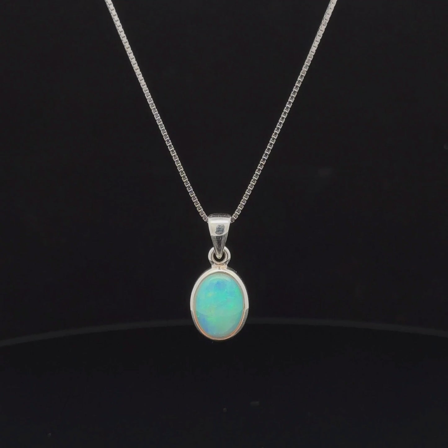 
                  
                    Load and play video in Gallery viewer, Oval Ethiopian Opal Pendant
                  
                