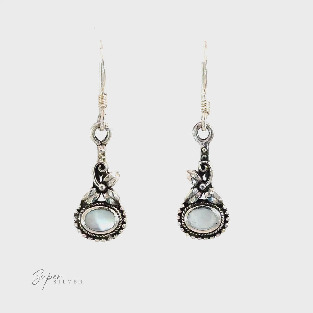 
                  
                    Load and play video in Gallery viewer, Inlaid Flower Earrings with Oval Stone
                  
                