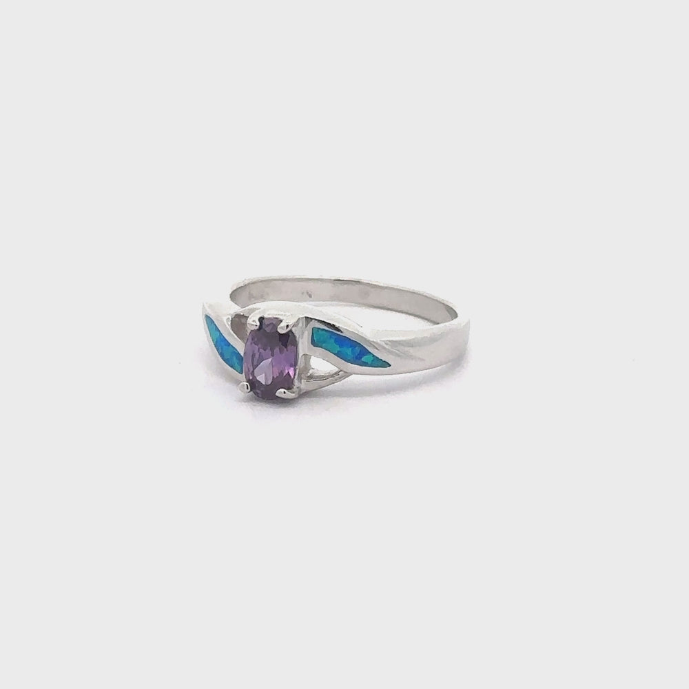 
                  
                    Load and play video in Gallery viewer, Blue Opal Ring with Purple Cubic Zirconia
                  
                