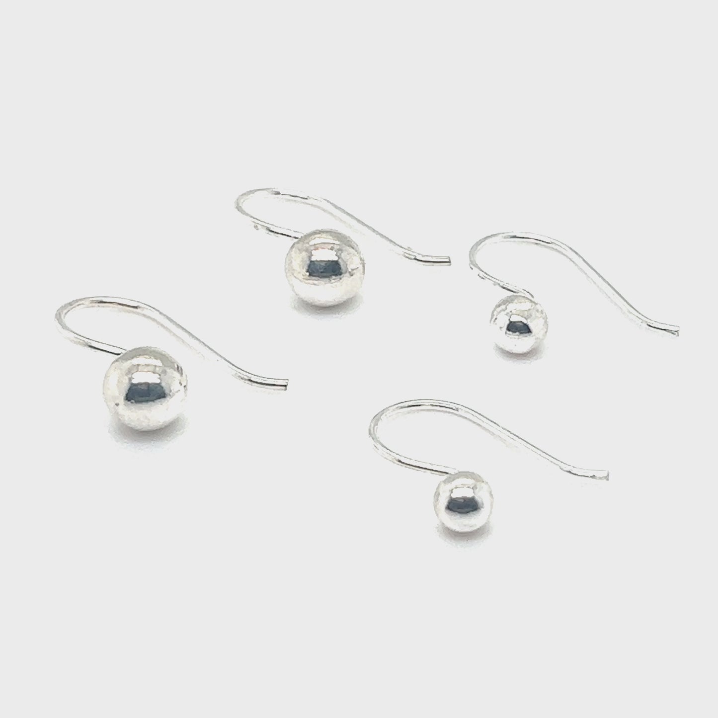 
                  
                    Load and play video in Gallery viewer, Dainty Fixed Ball Earrings
                  
                