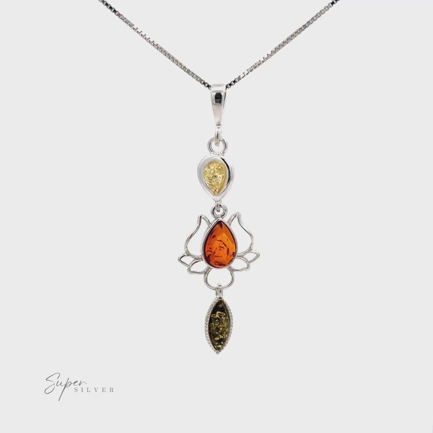 
                  
                    Load and play video in Gallery viewer, Amber Lotus Flower Pendant
                  
                