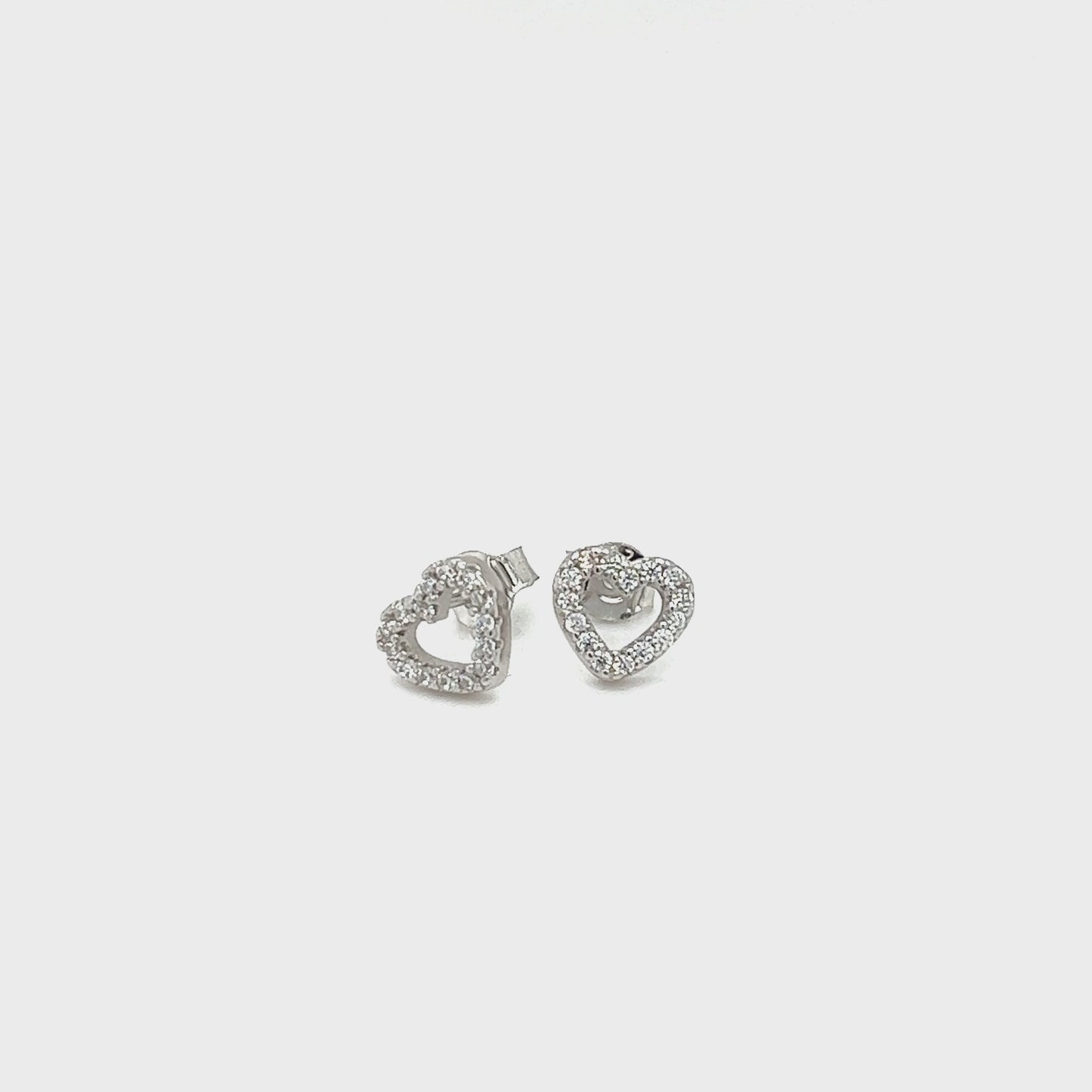 
                  
                    Load and play video in Gallery viewer, Heart Outline Cubic Zirconia Studs
                  
                
