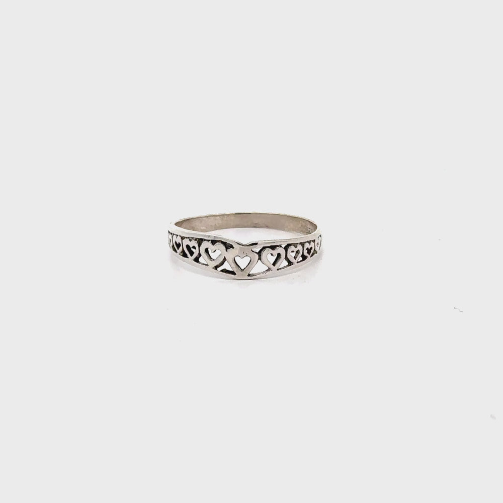
                  
                    Load and play video in Gallery viewer, Chevron Shaped Ring Lined with Hearts
                  
                
