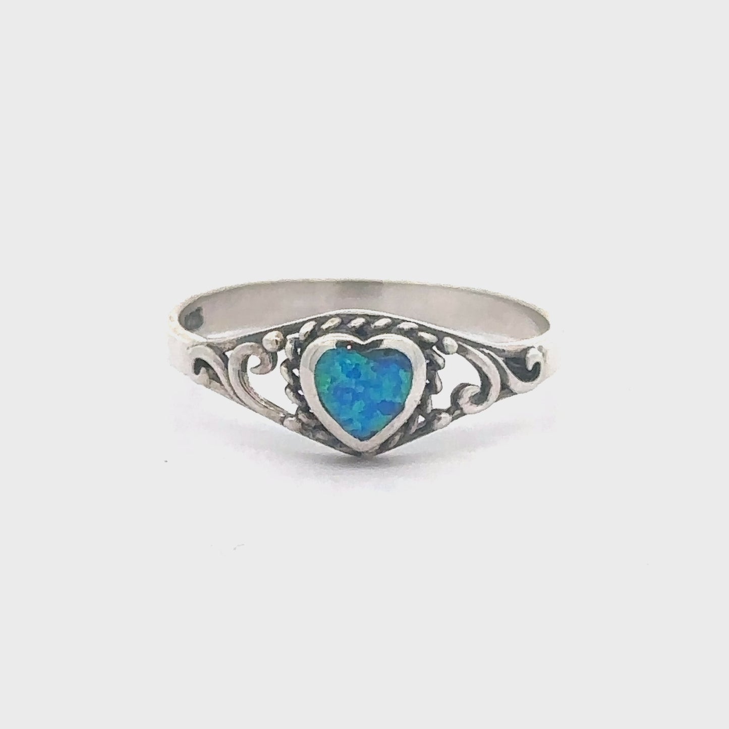 
                  
                    Load and play video in Gallery viewer, Dainty Blue Opal Heart Ring
                  
                
