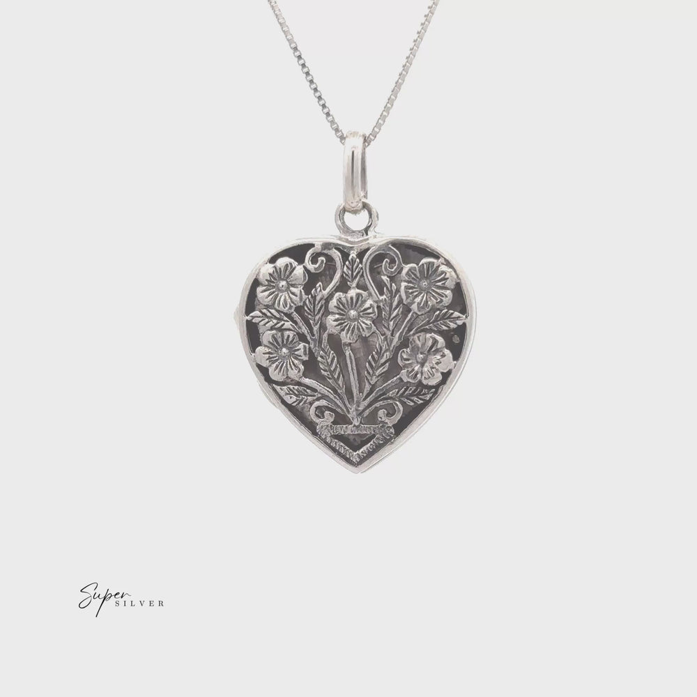 
                  
                    Load and play video in Gallery viewer, Floral Heart Shaped Locket
                  
                