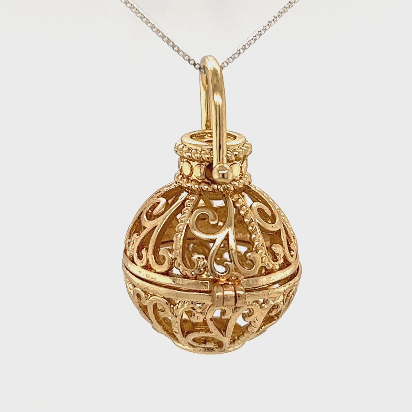 
                  
                    Load and play video in Gallery viewer, Filigree Cage Pendant
                  
                